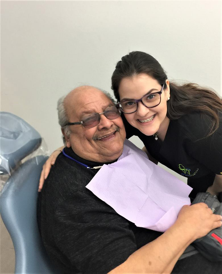 Dental Park staff member smiles with patient